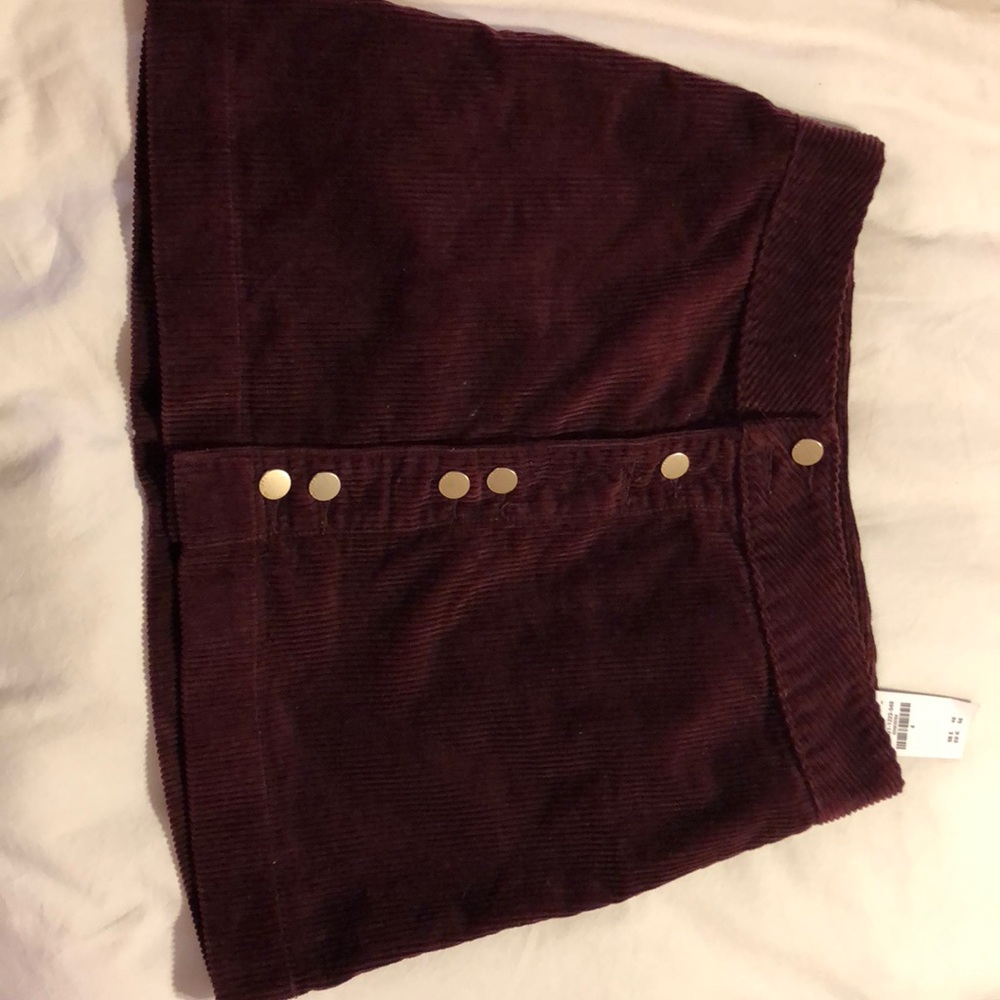 A suede burgundy skirt